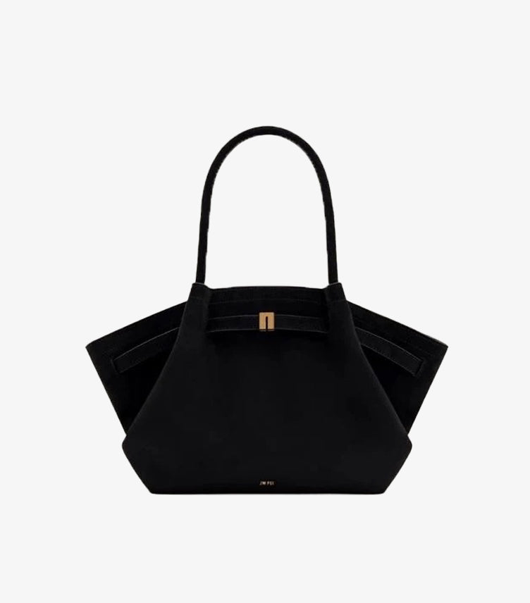 Front product view of JW PEI Hana medium faux-suede handbag with dual handles and winged construction