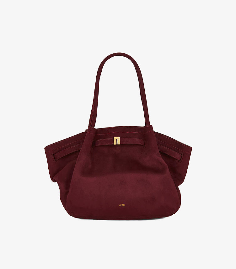 Straight-on view of JW PEI Hana medium tote bag featuring a soft structured body and magnetic closure