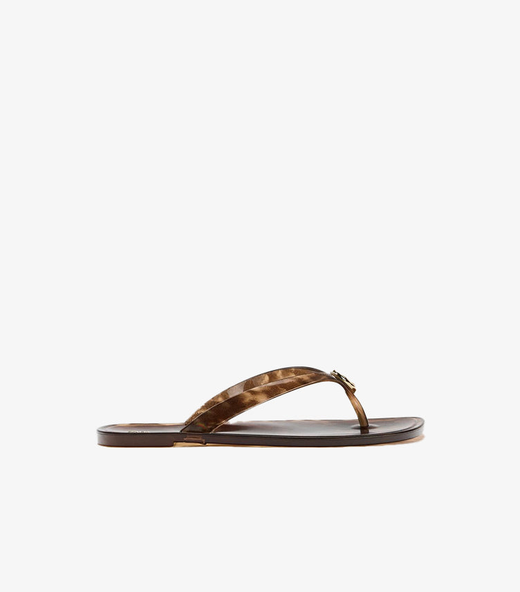 Side view of Zara women’s brown tortoiseshell flat toe-post sandal with slim straps and gold-tone ornament