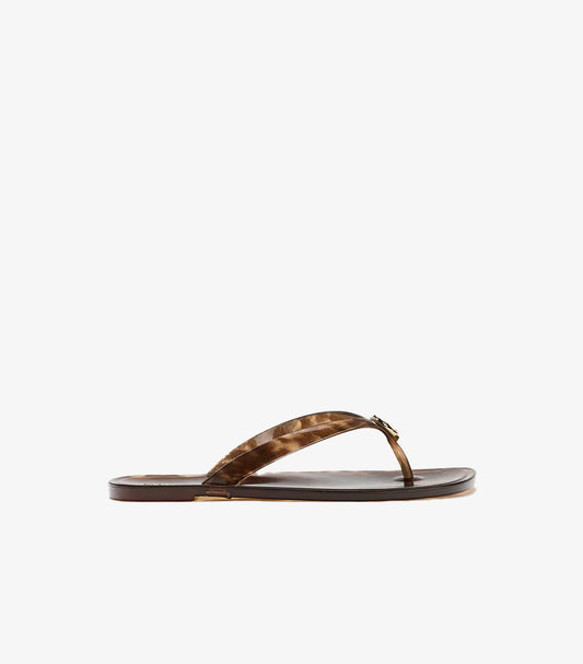 Side view of Zara women’s brown tortoiseshell flat toe-post sandal with slim straps and gold-tone ornament