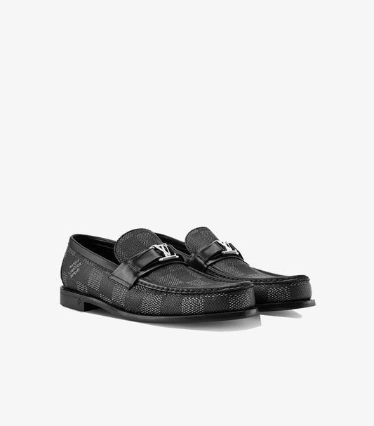 Louis Vuitton Major loafers with silver LV initials front angle