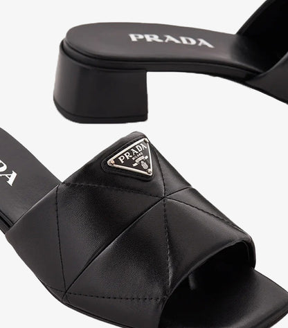 Prada Triangle Logo Quilted Leather Mule Heels Close-Up Detail