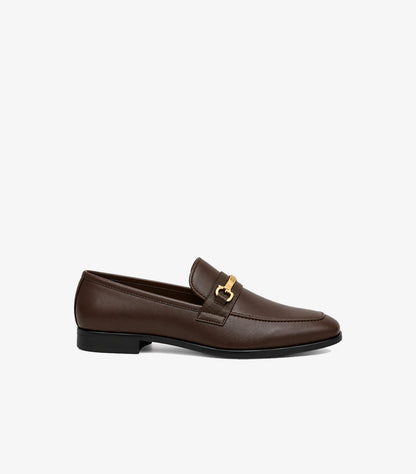 GUESS men's formal slip-on loafers featuring a sleek side profile, low heel and stitched leather-look upper