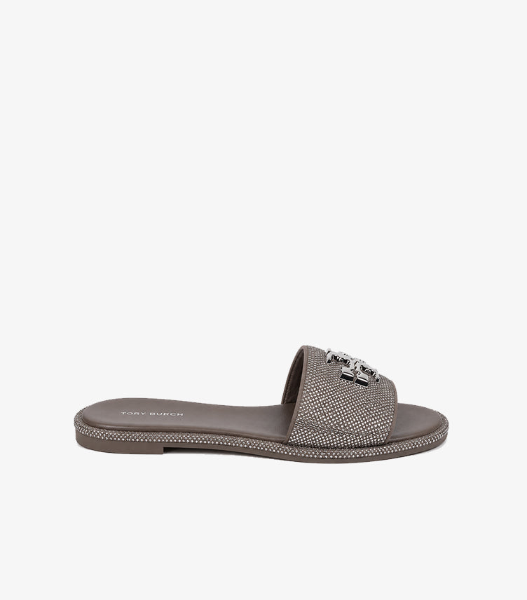 Tory Burch Eleanor taupe crystal flat slide sandal side profile showing full rhinestone sole edge border and wide embellished strap