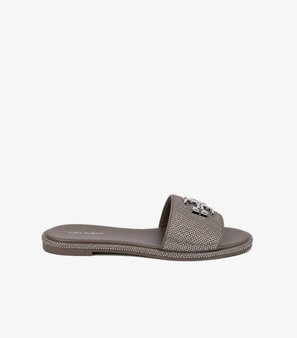 Tory Burch Eleanor taupe crystal flat slide sandal side profile showing full rhinestone sole edge border and wide embellished strap