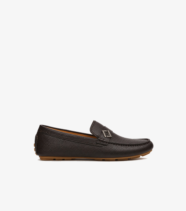 Side profile of Fendi luxury leather driving loafers featuring flexible rubber sole and premium craftsmanship.