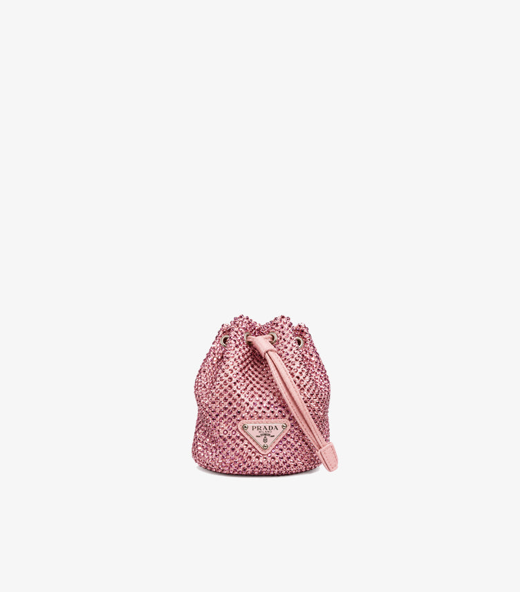 Front view of Prada pink crystal-embellished mini drawstring clutch with wrist strap and triangle logo