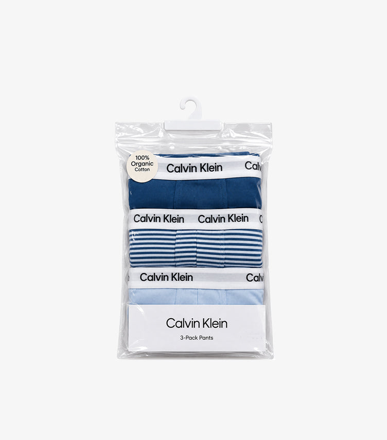 Calvin Klein kids’ three-pack organic cotton trunks in dark blue, striped blue and light blue with branded waistbands