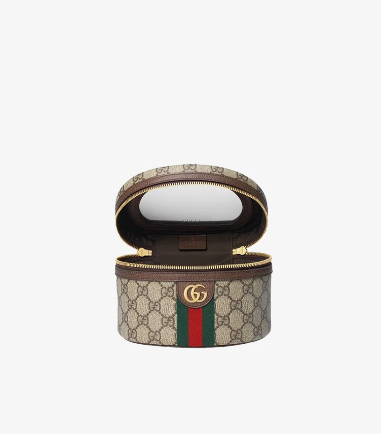 Open Gucci Ophidia cosmetic vanity case displaying the interior compartment and mirror inside the lid