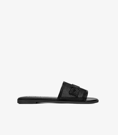 Side view of DKNY black slip-on slide sandal with semi-sheer mesh strap and slim flat sole