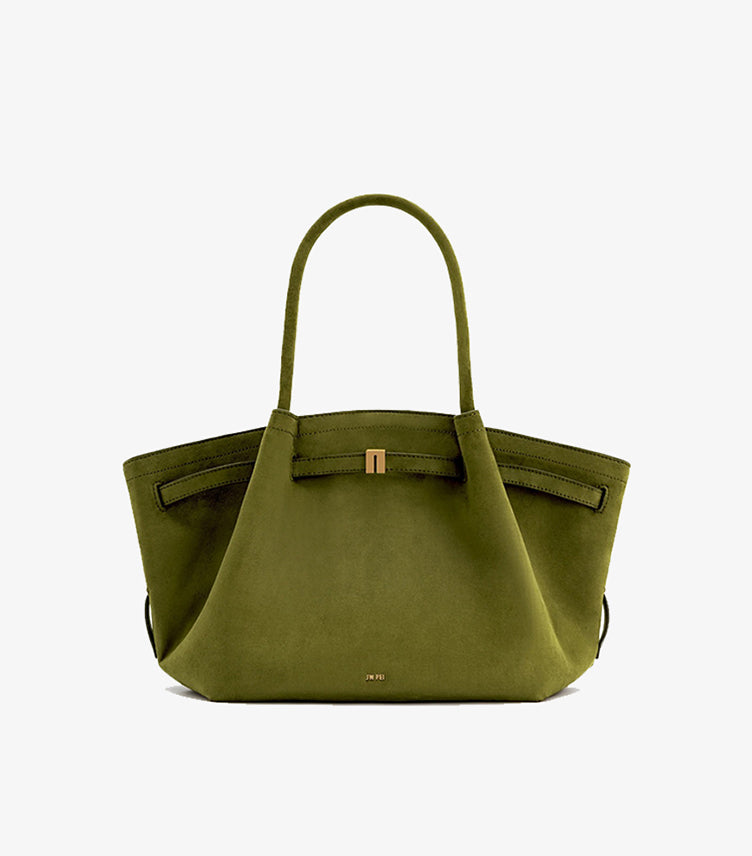 Front view of JW PEI Hana medium shoulder tote showing its sculptural trapezoid silhouette and subtle logo