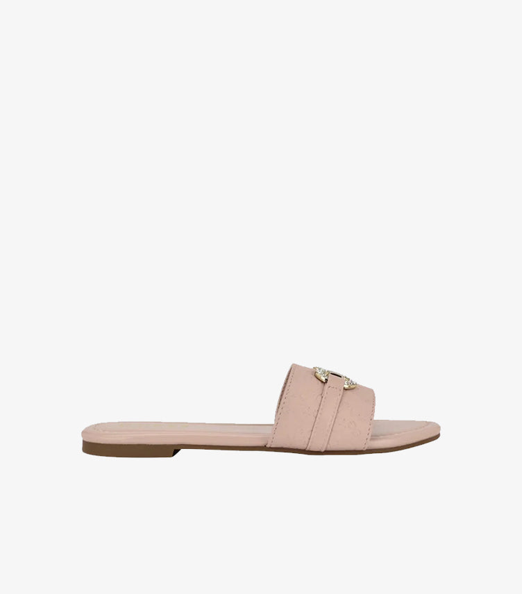 Side view of Guess women’s blush pink flat slide sandal with embellished gold-tone logo hardware