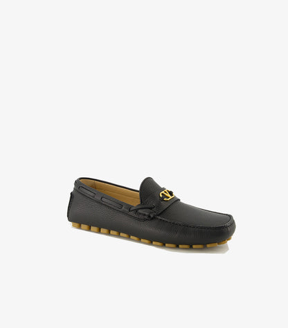 Valentino Garavani black leather slip-on moccasin loafer with gold VLogo detail angled view