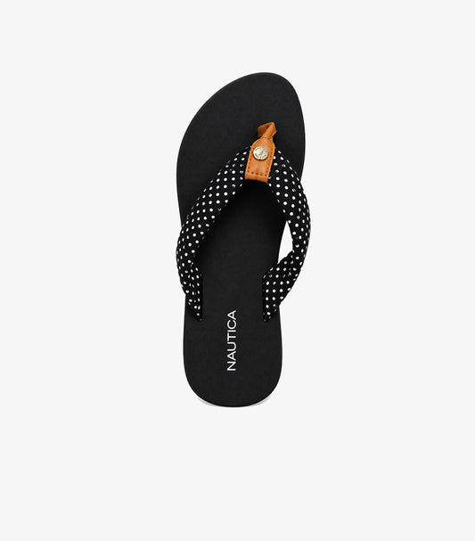 Top view of Nautica women’s black polka dot flip-flop sandals showing thong straps and contrasting toe-post details