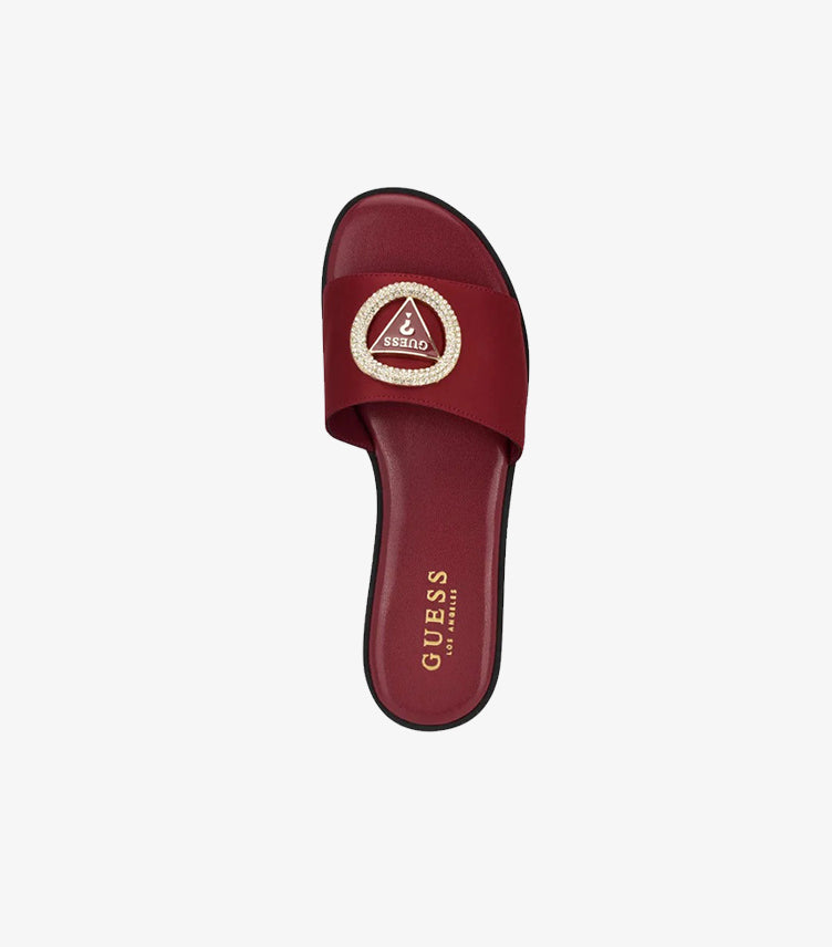 Top view of Guess women’s burgundy flat slide sandal with crystal-embellished triangle logo