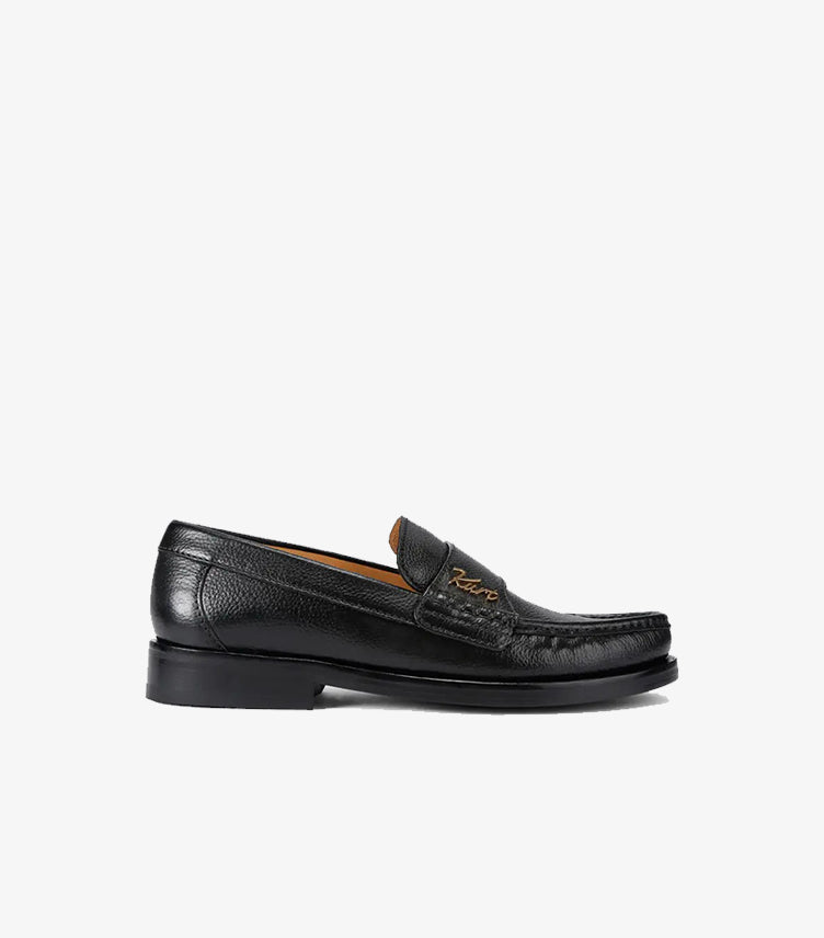 Side profile of Kurt Geiger men's black leather penny loafer featuring classic moc toe construction.
